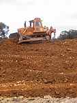 Dozer on top of bank